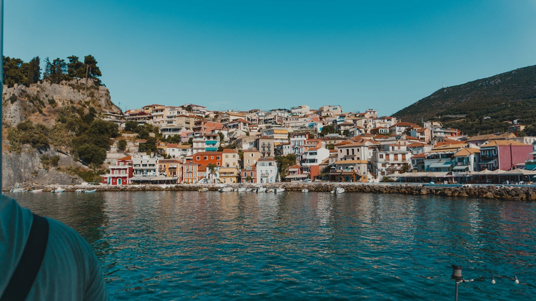 Coastal town with colorful buildings and boats in harbor