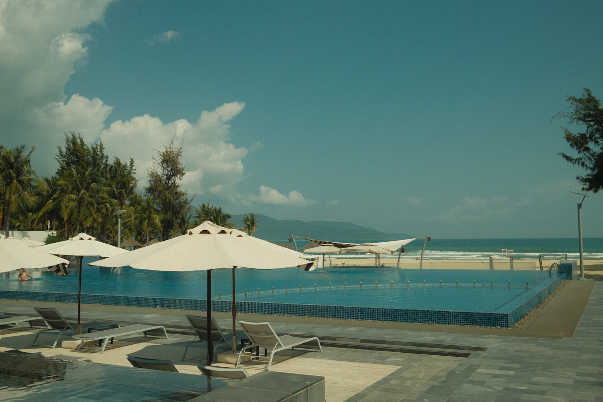 Resort swimming pool overlooking the ocean and beach